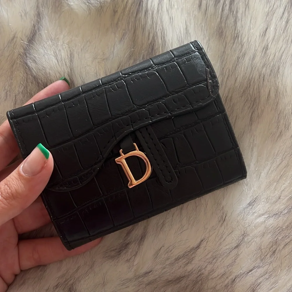 Black Croc-Embossed Women's “CD Saddle Wallet” with Gold Trim